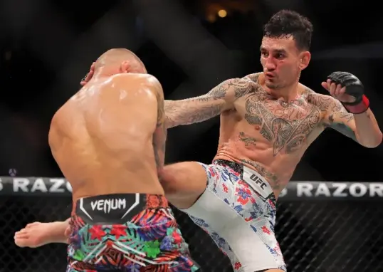 max holloway vs charles oliveira ufc 326 — IN news