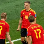 Trossard brace guides Belgium to World Cup knockouts as New Zealand exit
