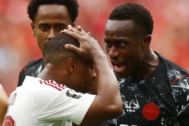Soccer Football - FIFA World Cup 2026 - Group B - Canada v Qatar - BC Place, Vancouver, Canada - June 18, 2026 Canada's Richie Laryea shouts at Qatar's Assim Madibo after his challenge that injured Canada's Ismael Kone REUTERS/Lee Smith TPX IMAGES OF THE DAY