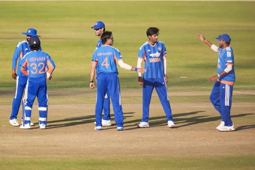 India's players celebrate a wicket